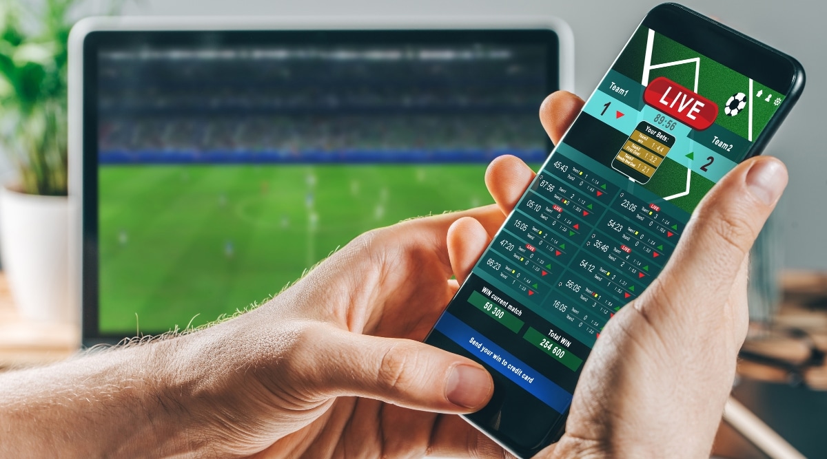 Man Betting on Sports on App